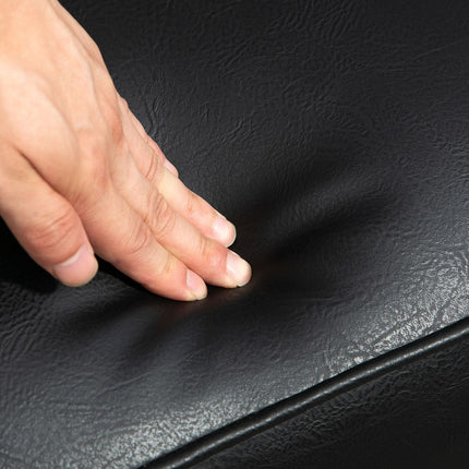 Upholstered chair in artificial leather, upholstered with armrests
