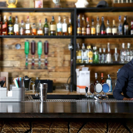 Wall-mounted bottle holder