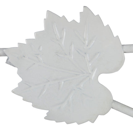 White flower pedestal in metal