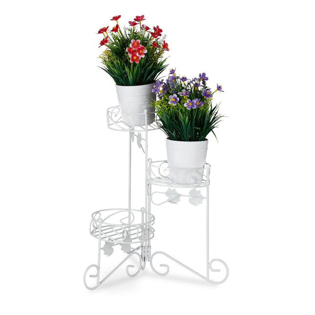 White flower pedestal in metal