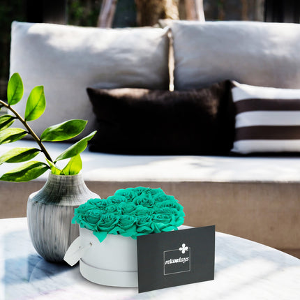 White heart-shaped rose box with 18 roses