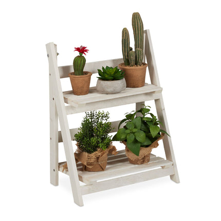 White stairs with wooden flowers