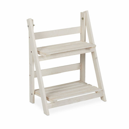 White stairs with wooden flowers