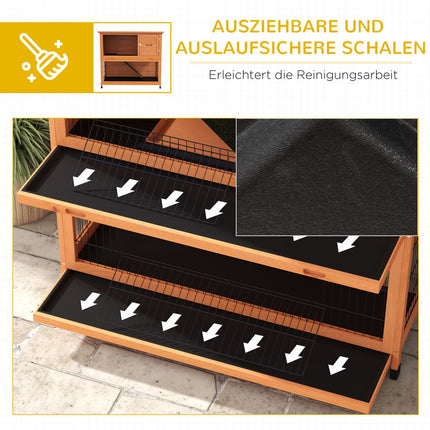 2-story wooden rabbit hutch with outdoor ramp