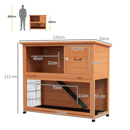 2-story wooden rabbit hutch with outdoor ramp