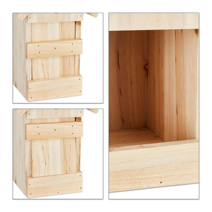 Wooden birdhouse with pointed roof