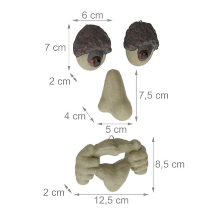 Wooden face with protruding tongue