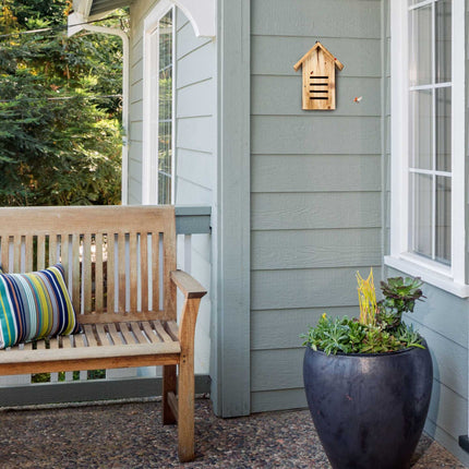Wooden ladybug house with flames