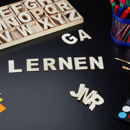 letter set in wood with 208 parts natural
