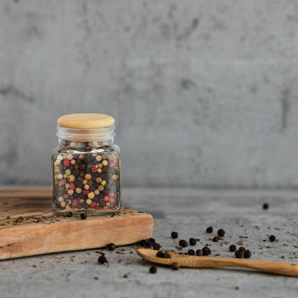 set of 8 spice jars with bamboo lids